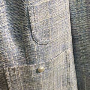 Apostrophe light blue skirt suit with ruffle hem